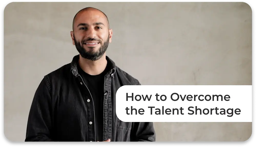 Man looking into the camera with the caption How to Overcome the Talent Shortage